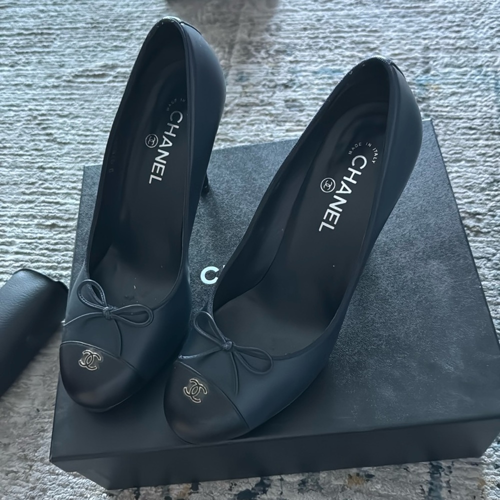 Navy and black Chanel pumps